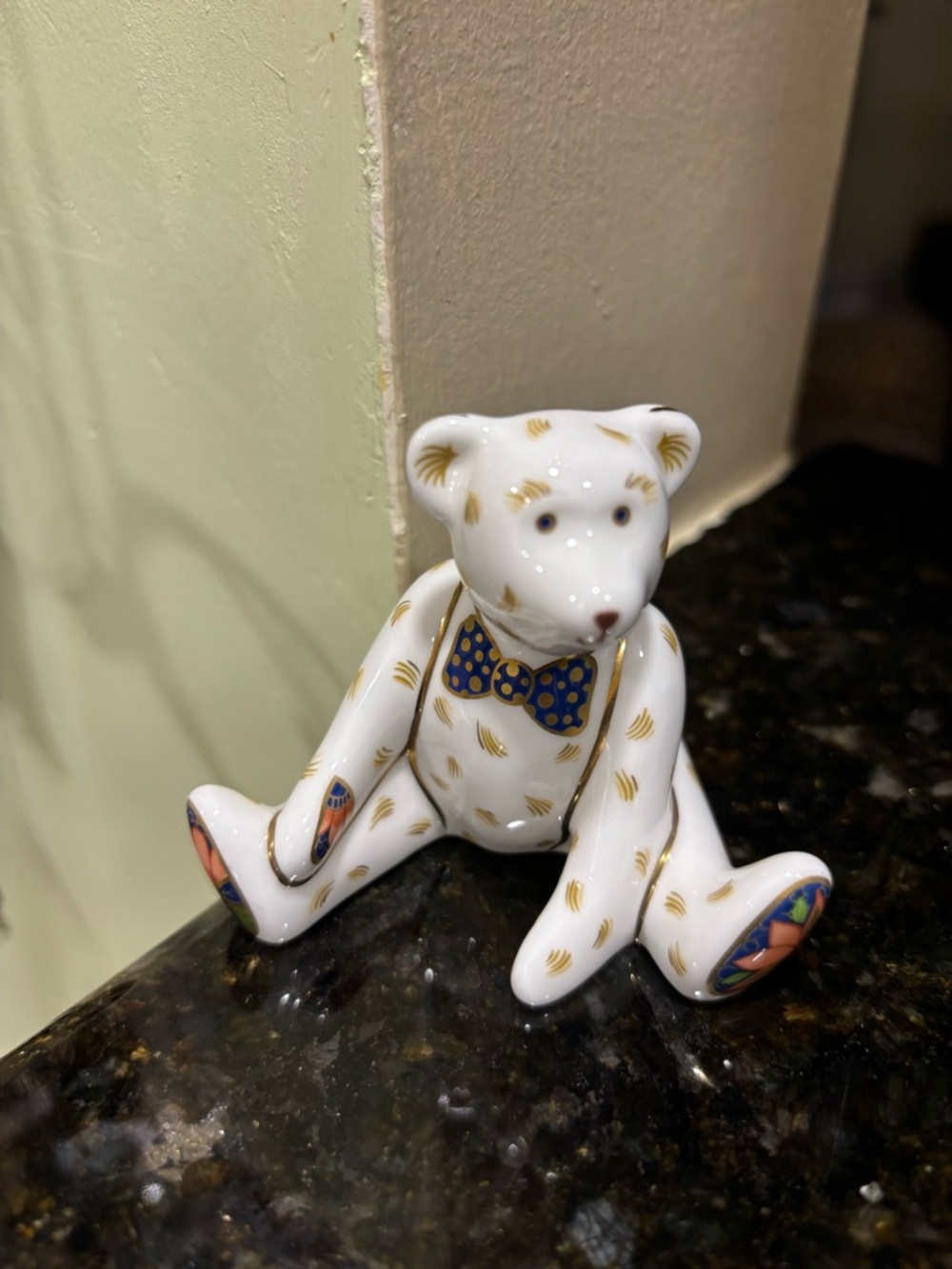 Porcelain White Bear Figurine with Gold Accents and Blue Bow